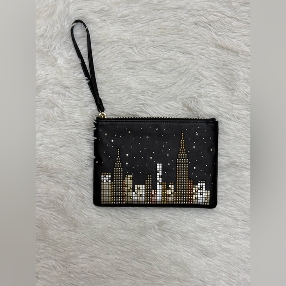 kate spade Handbags - Kate Spade Black and Gold Skyline Wristlet